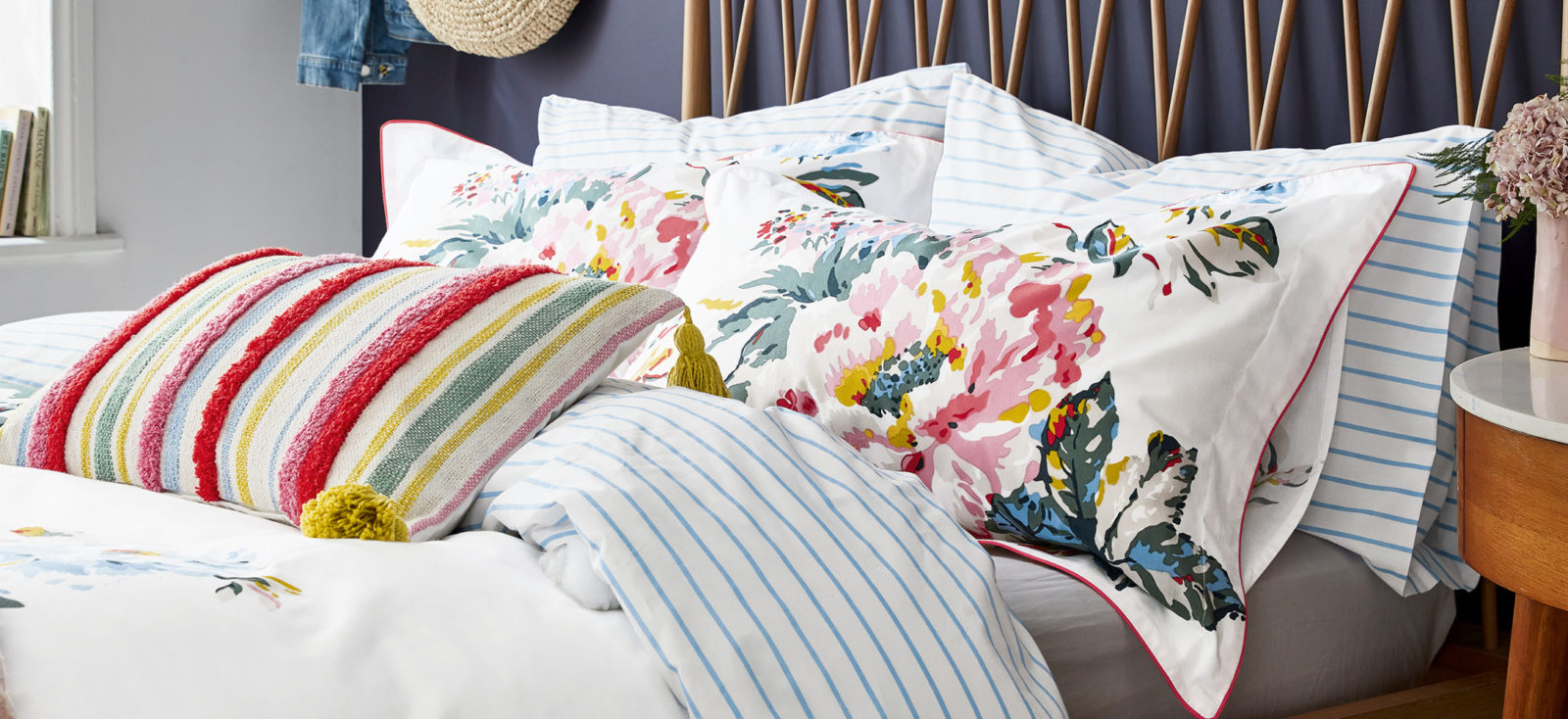 Bed with Joules bedding on it.